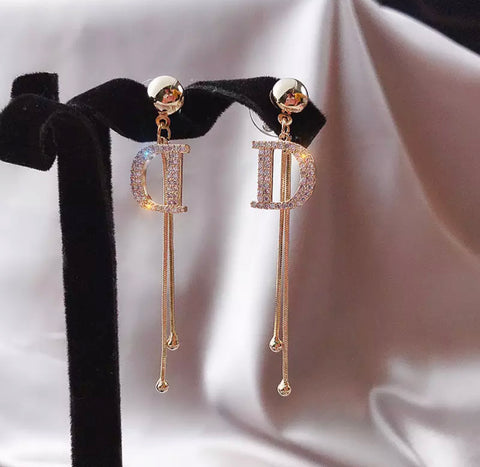 D earrings